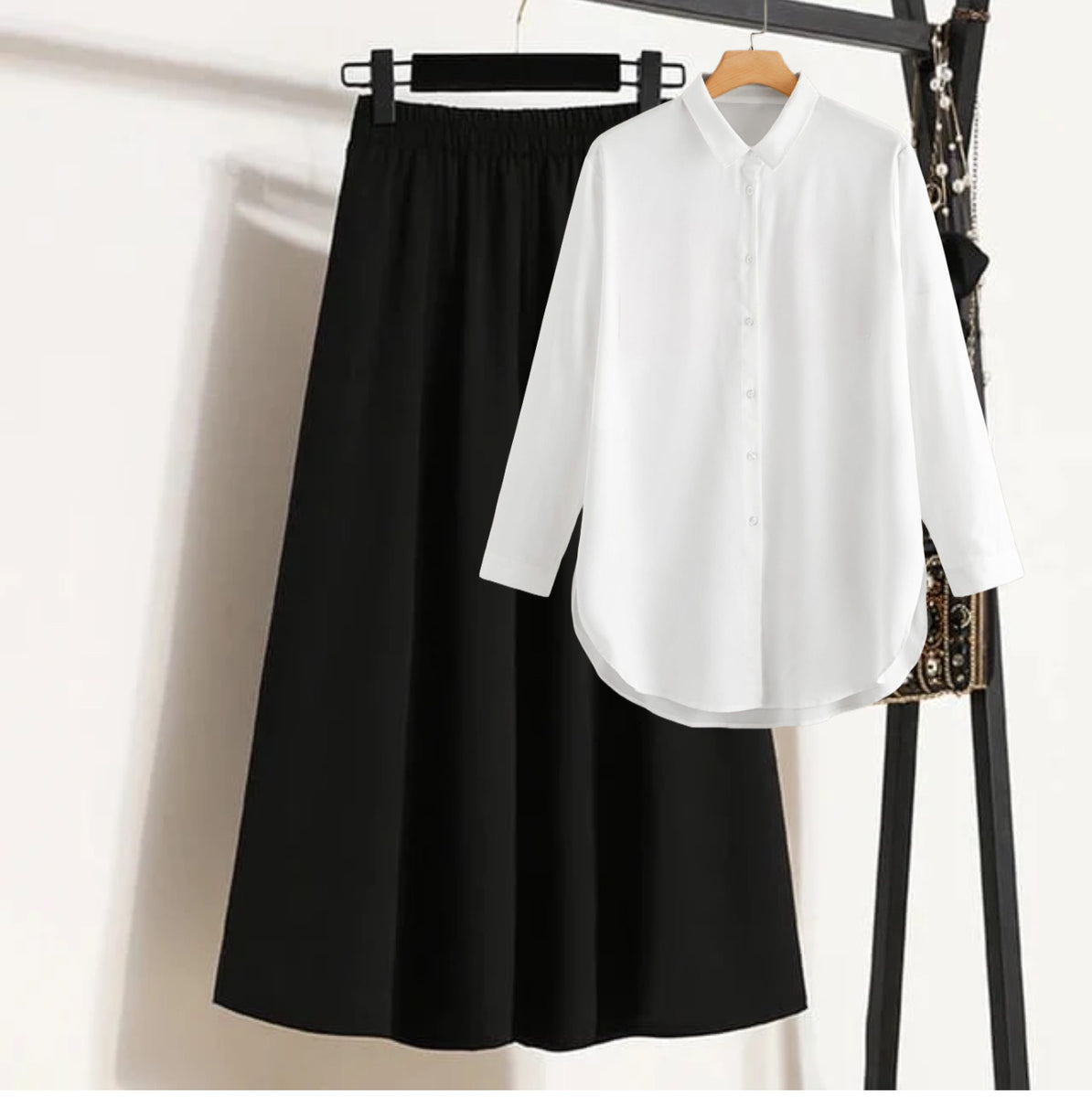 Black skirt with white button down shirt