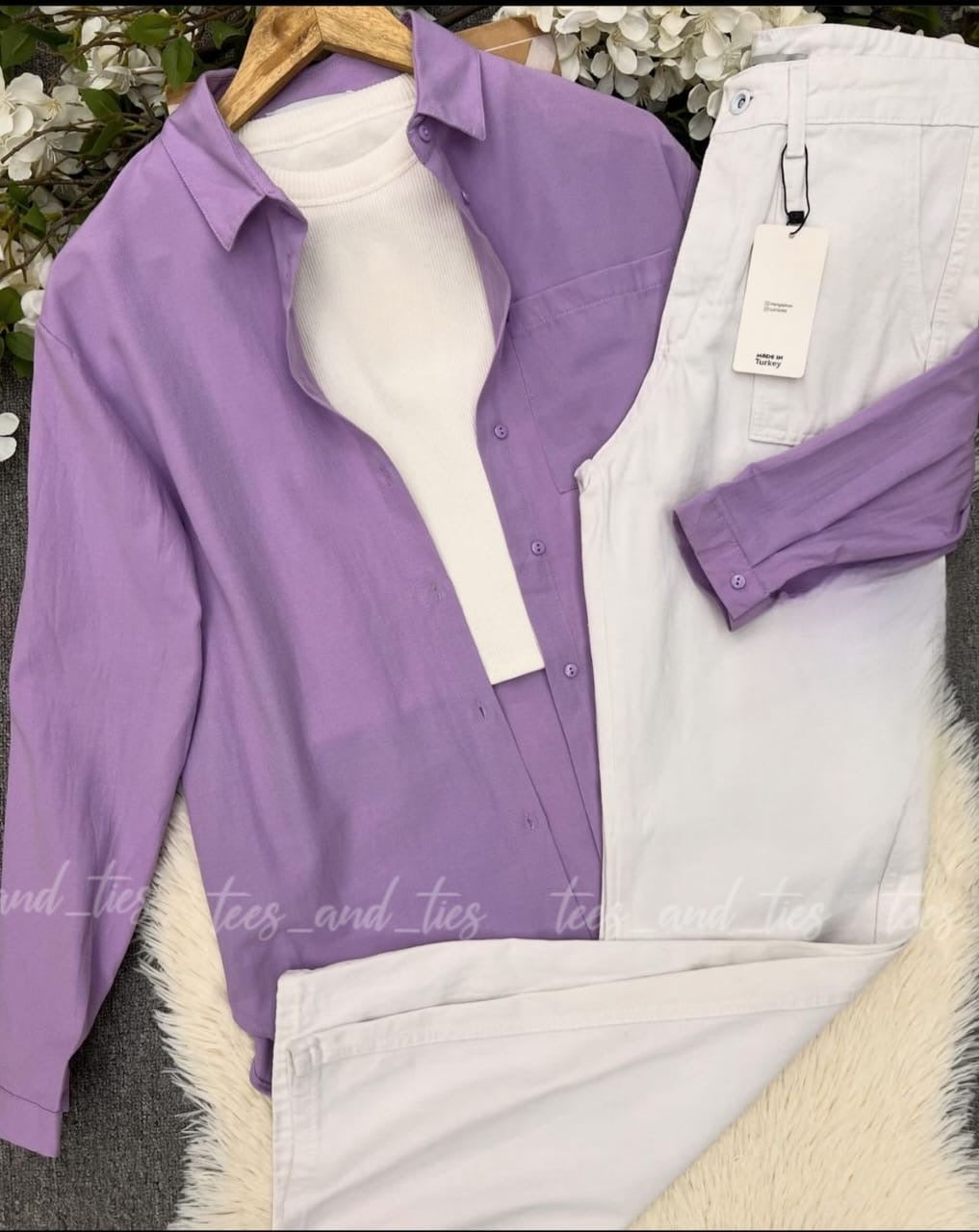 Button down with white inner camisole and white wide leg jeans by TeesnTies, view 10 of 10