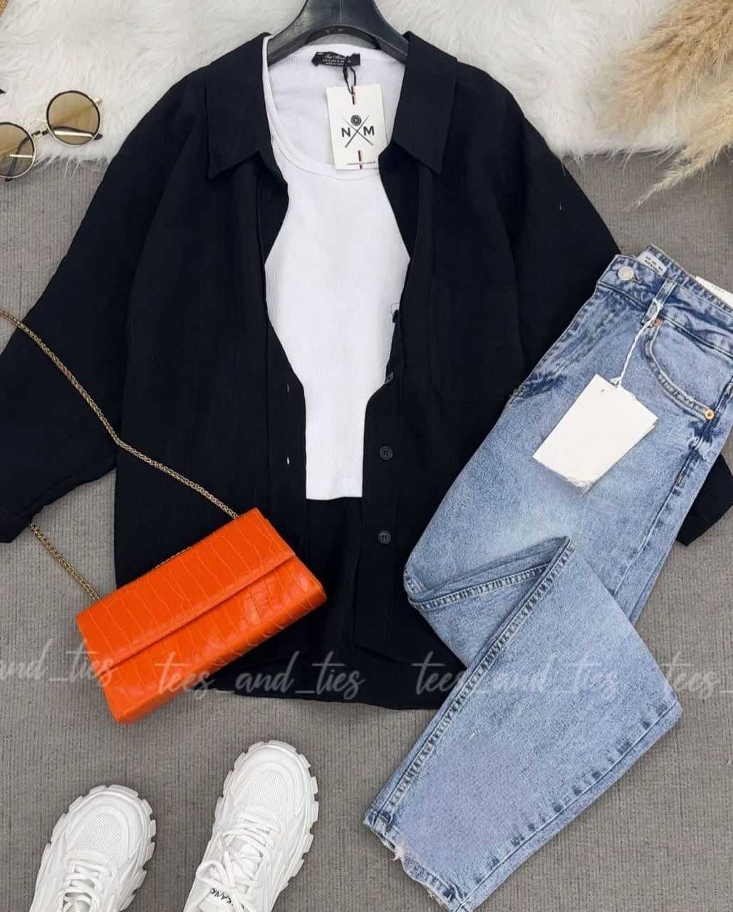 Black button down with white inner camisole and mom fit jeans by TeesnTies, view 1 of 1