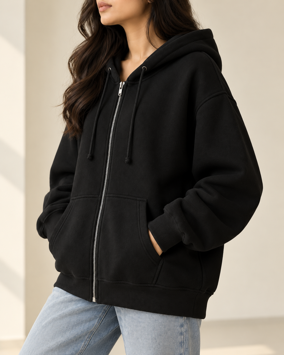 Black oversized zip-up hoodie with a drawstring hood, by TeesnTies, view 2 of 4