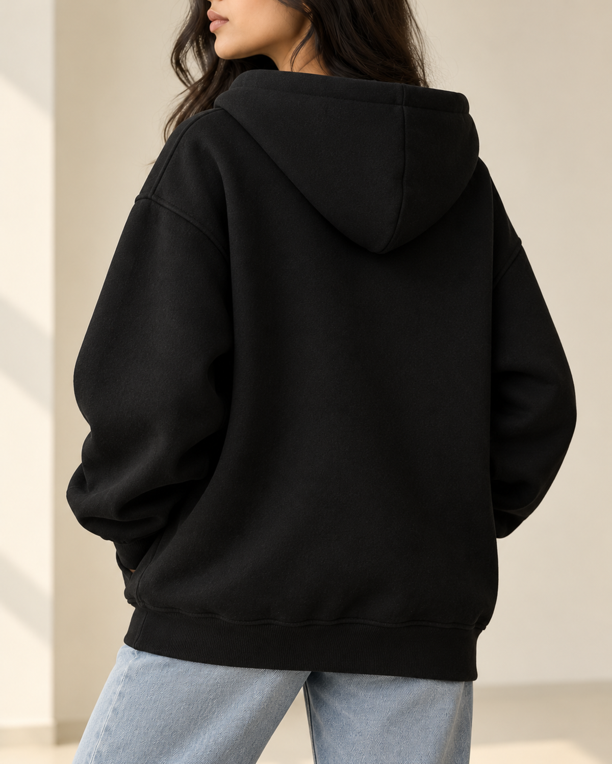 Black oversized zip-up hoodie with a drawstring hood, by TeesnTies, view 3 of 4