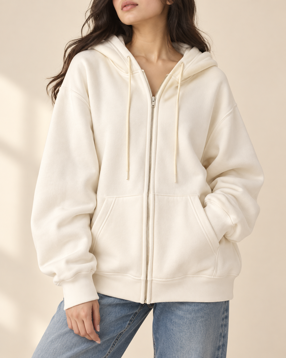 White oversized zip-up hoodie with a drawstring hood, by TeesnTies, view 1 of 4