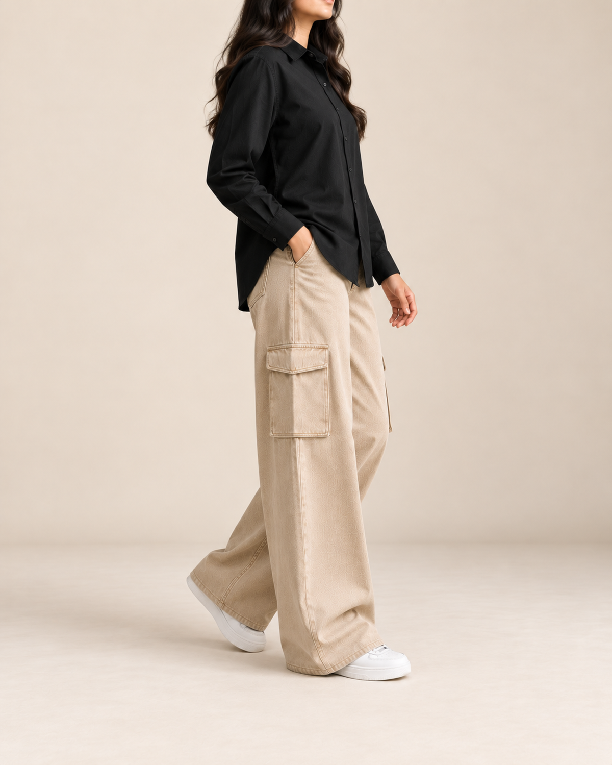 Black button-down shirt and beige cargo jeans, side view showing the cargo pocket