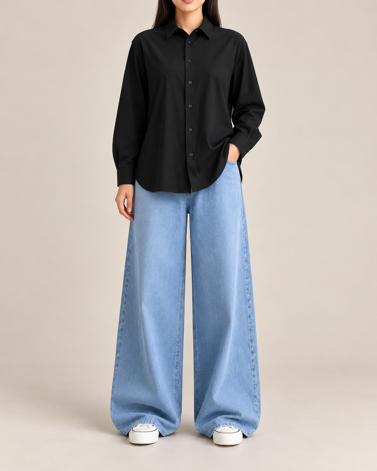 Black button-down shirt with sky blue wide-leg jeans, front view