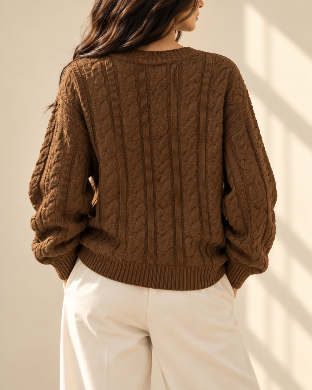 Woman wearing the brown Aspen cable knit pullover, view 3 of 4