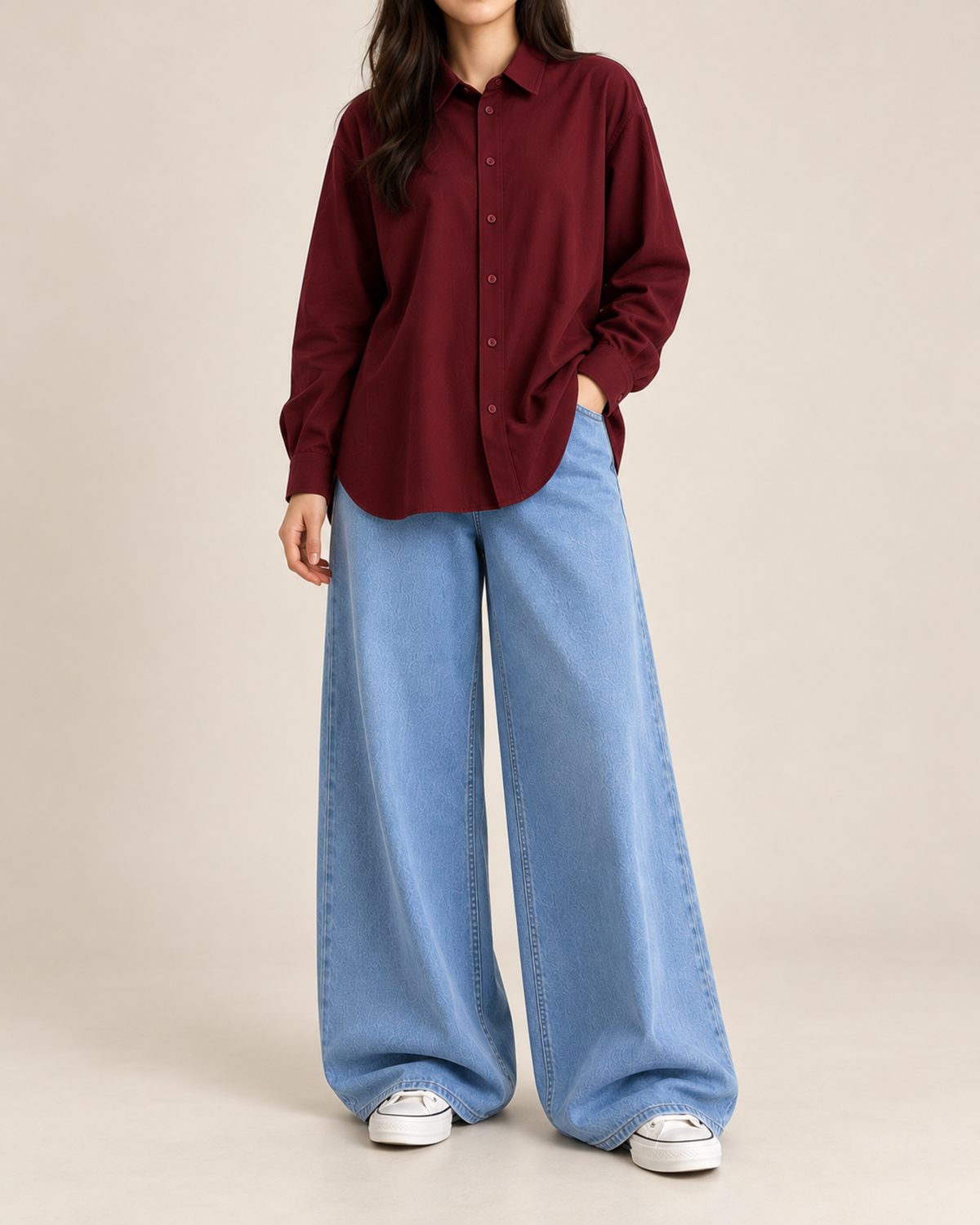 Maroon button-down shirt with sky blue wide-leg jeans, front view