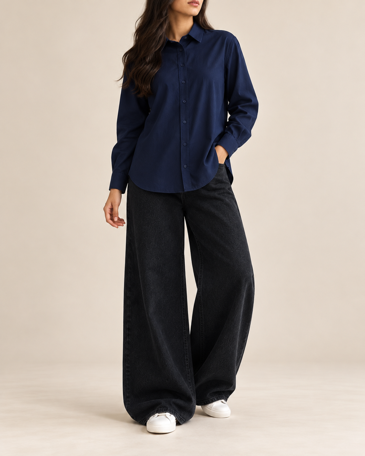 Navy blue button-down shirt with black wide-leg jeans, front view
