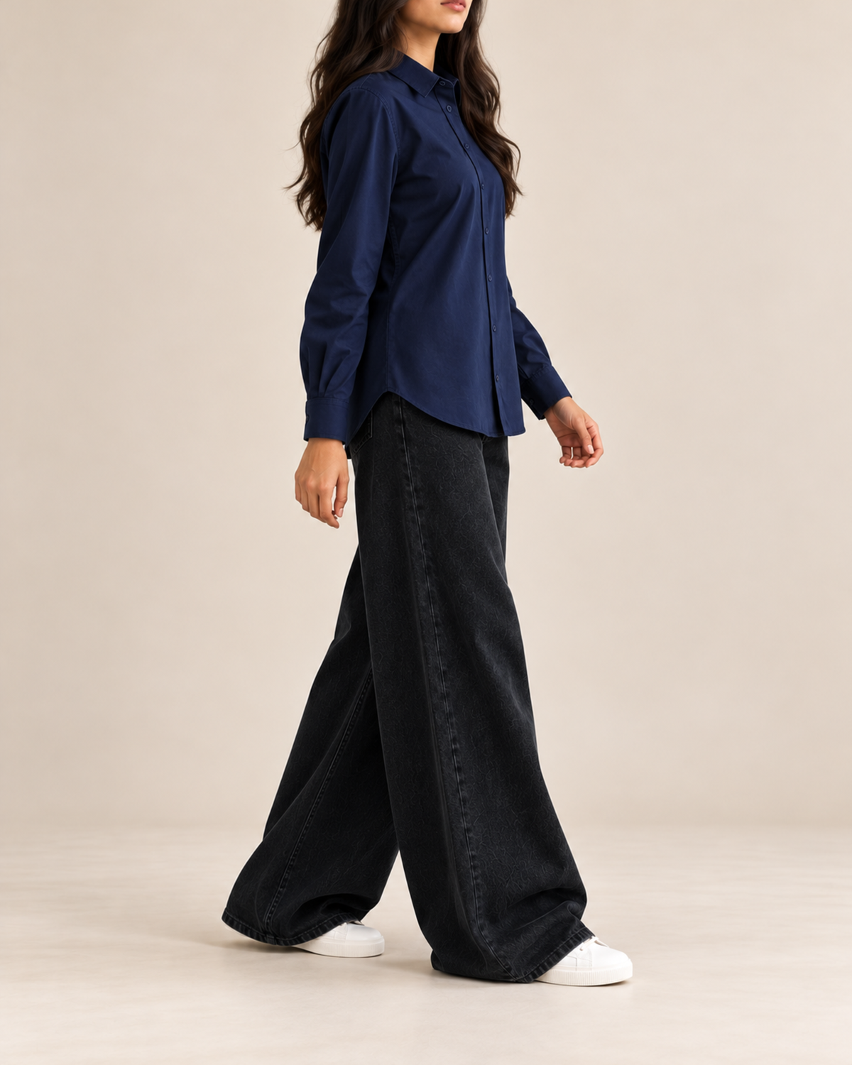 Back view of navy button-down shirt with black wide-leg jeans