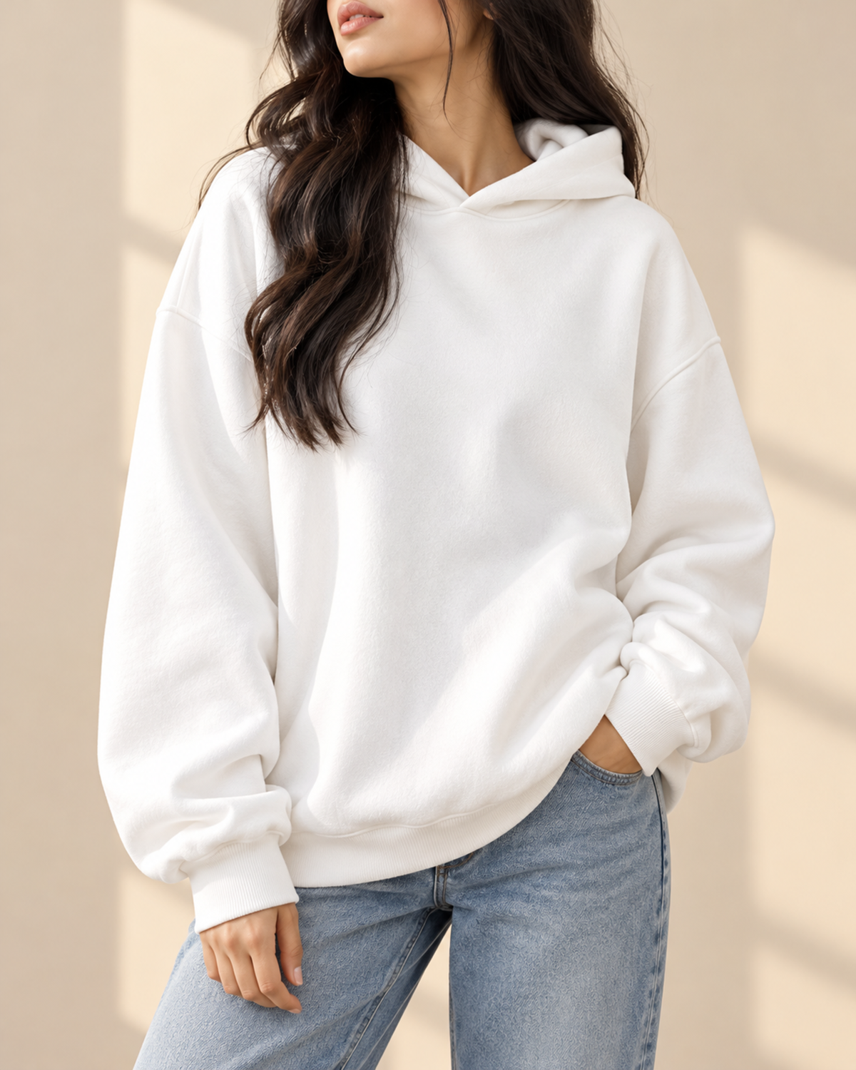 White oversized hoodie with front pocket, front view