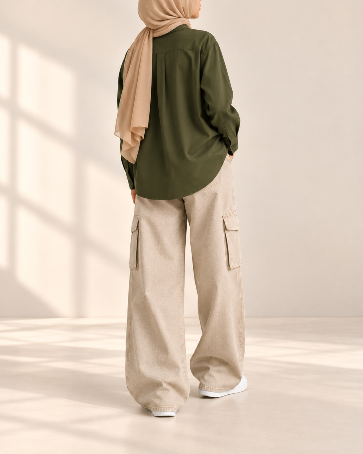 Back view of olive shirt with beige cargo jeans