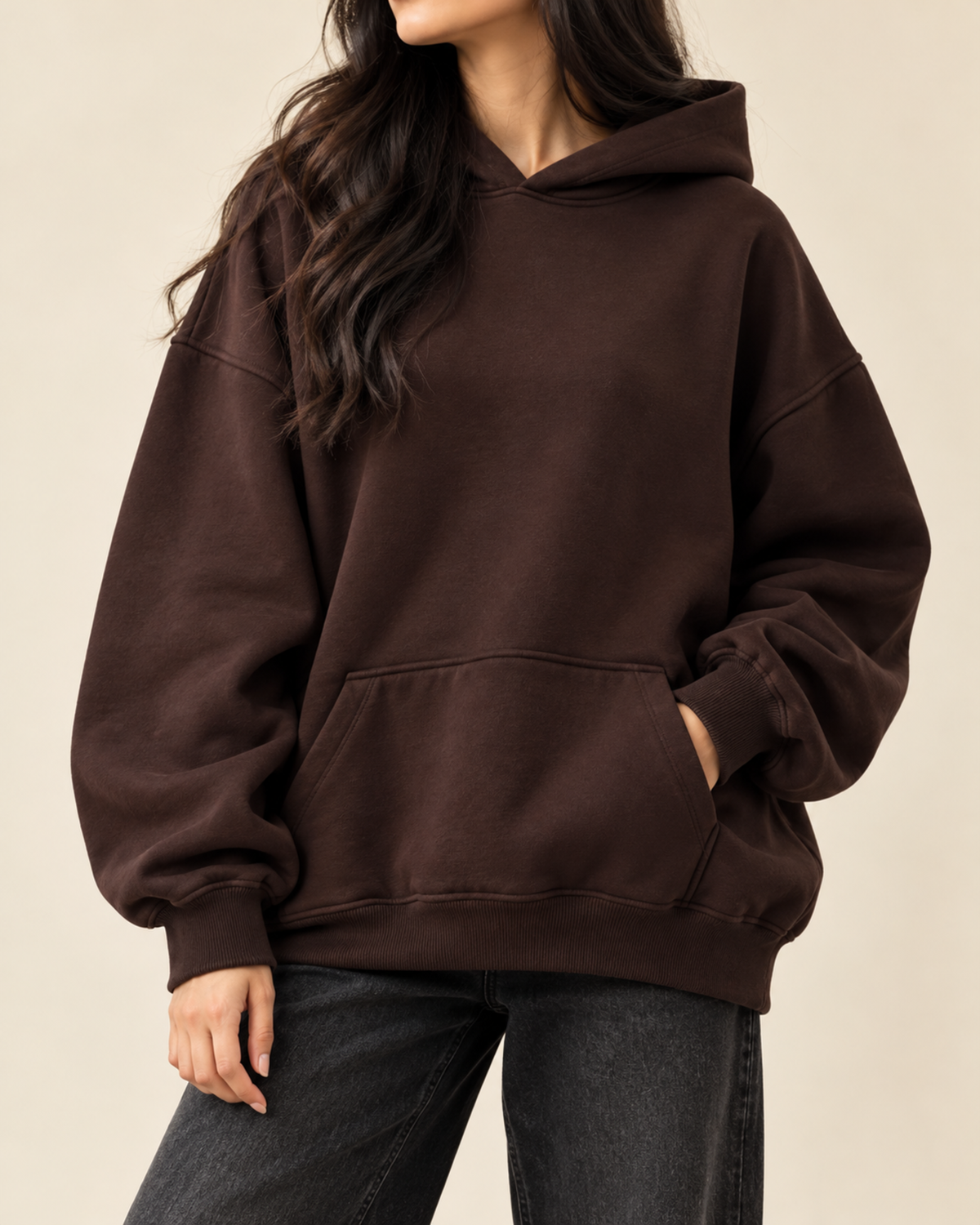 Dark brown oversized hoodie with front pocket, front view
