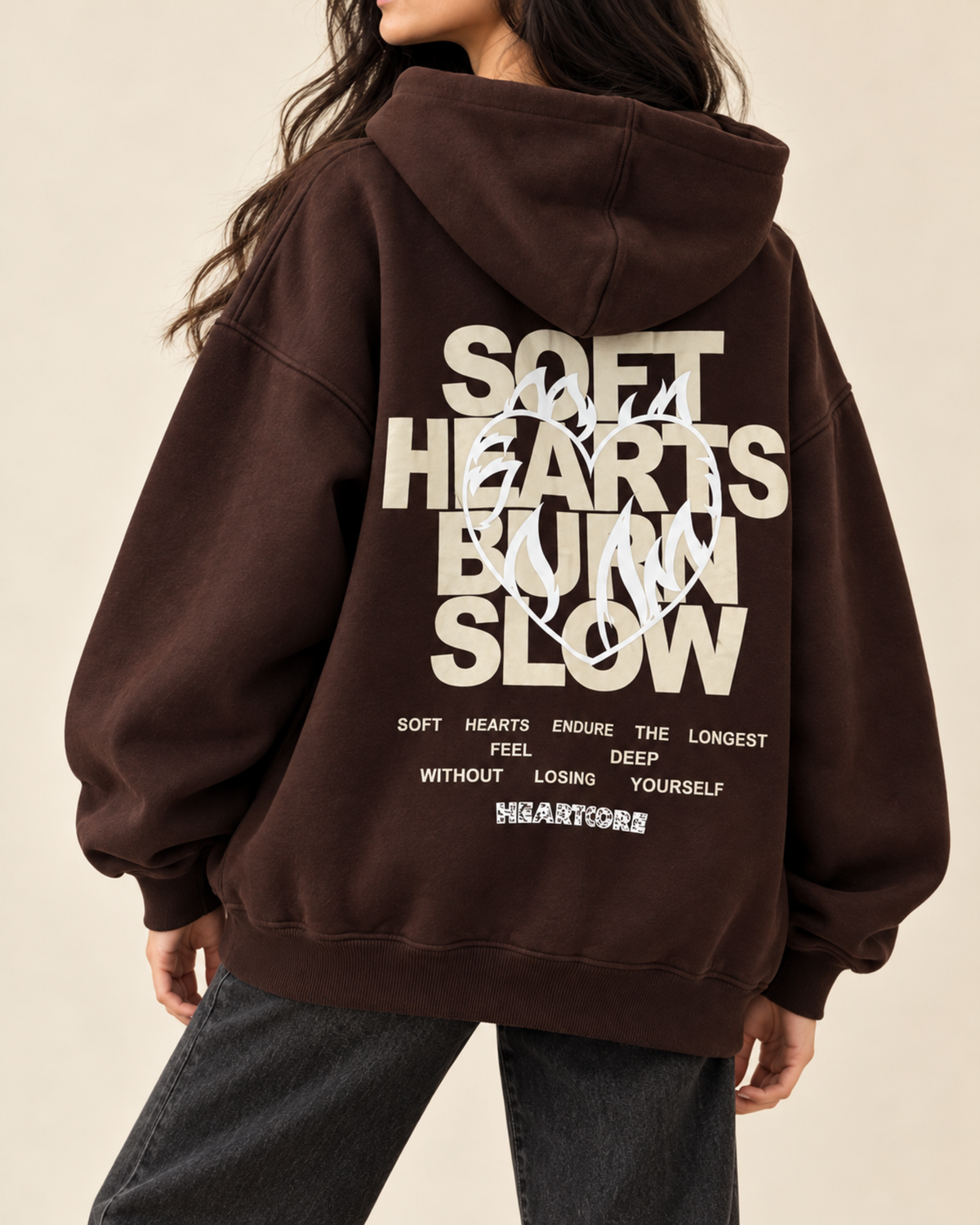 Back view of dark brown hoodie with Soft Hearts Burn Slow print